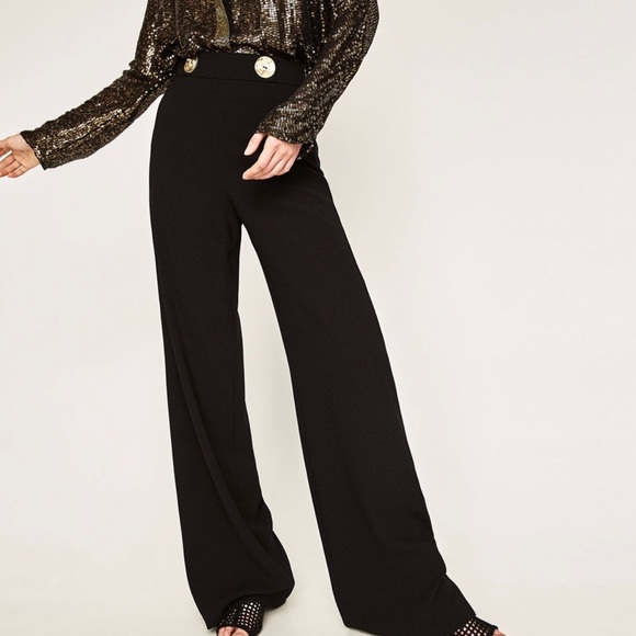 black high waisted trousers with gold buttons